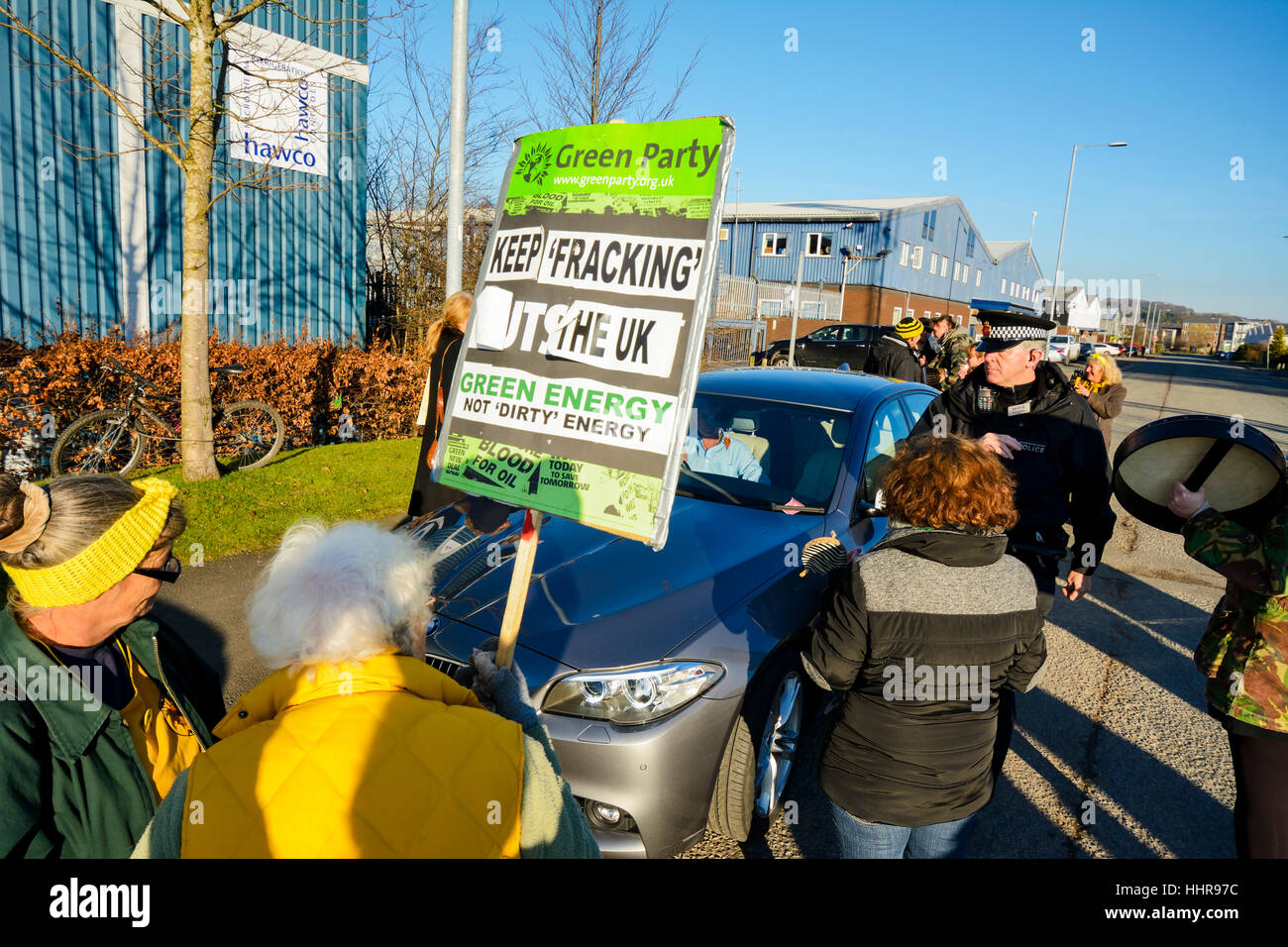 Bolton Lancashire, UK. 20th January 2017: A small group of protesters blocked the entrance to A E Yates business premises near the Bolton Wanderers Football stadium today demanding they cease delivering aggregates to the Cuadrilla shalegas site on Preston New Road in Little Plumpton near Blackpool and that they have no further involvement with fracking companies. The aggregate is used to lay foundations for the drillpad and also to allow the heavy supply vehicles onsite without getting bogged down in the soft ground in the field. Credit: Dave Ellison/Alamy Live News Stock Photo