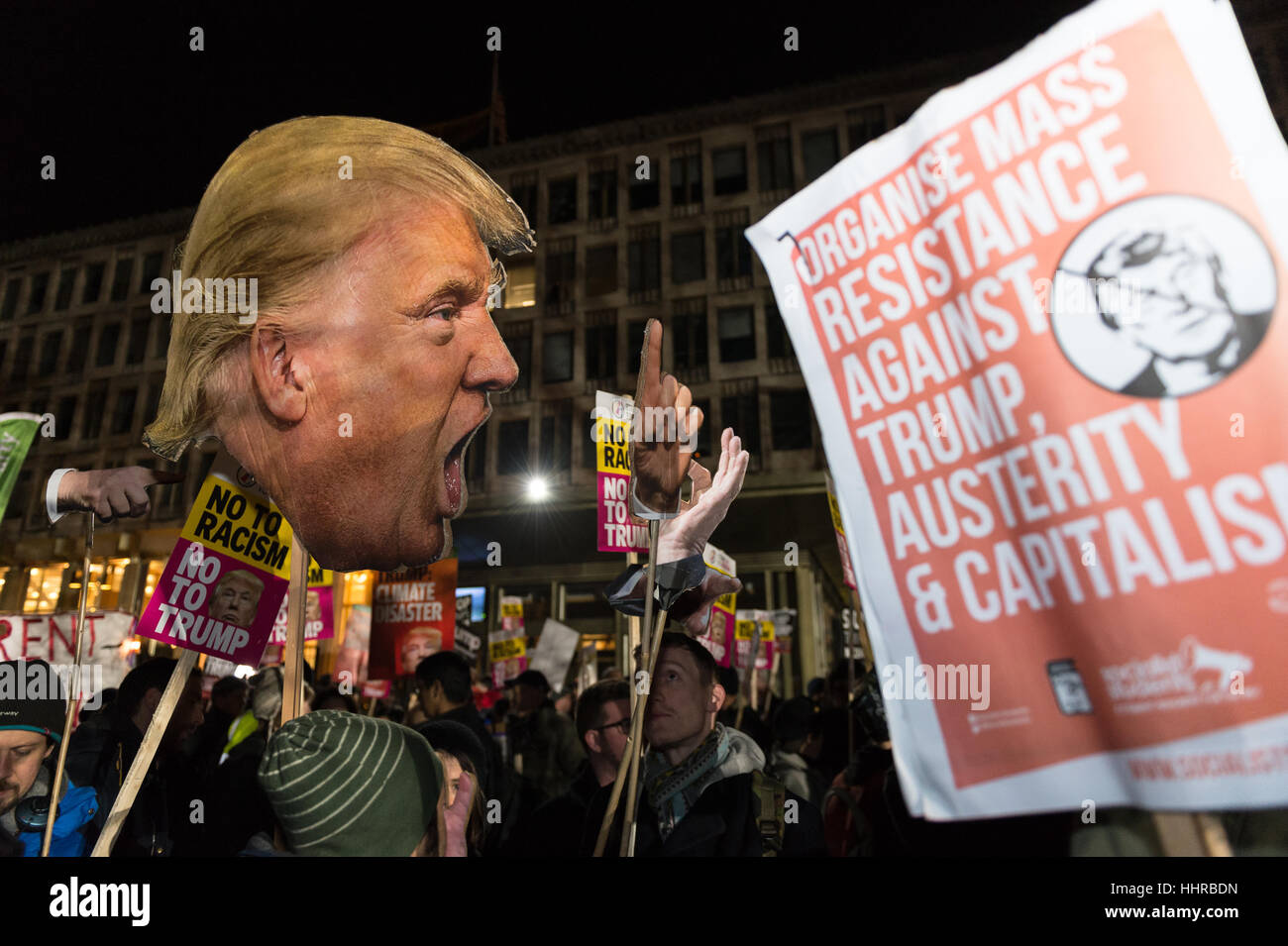London, UK. 20th January 2017. Hundreds of people gather outside the American embassy in Grosvenor Square to protest against Donald Trump on the day of his inauguration as the 45th President of the United States. The participants demonstrated over Trump's political rhetoric emphasized during the election campaign and his views on issues such as human rights, climate change, racism, immigration and nuclear arms. Credit: Wiktor Szymanowicz/Alamy Live News Stock Photo