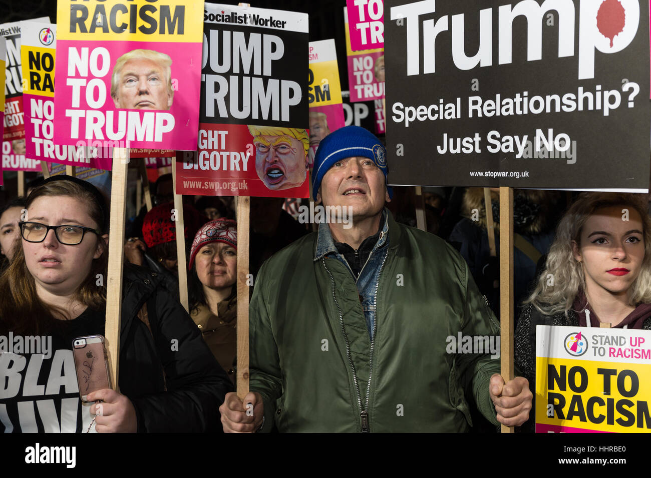 London, UK. 20th January 2017. Hundreds of people gather outside the American embassy in Grosvenor Square to protest against Donald Trump on the day of his inauguration as the 45th President of the United States. The participants demonstrated over Trump's political rhetoric emphasized during the election campaign and his views on issues such as human rights, climate change, racism, immigration and nuclear arms. Credit: Wiktor Szymanowicz/Alamy Live News Stock Photo