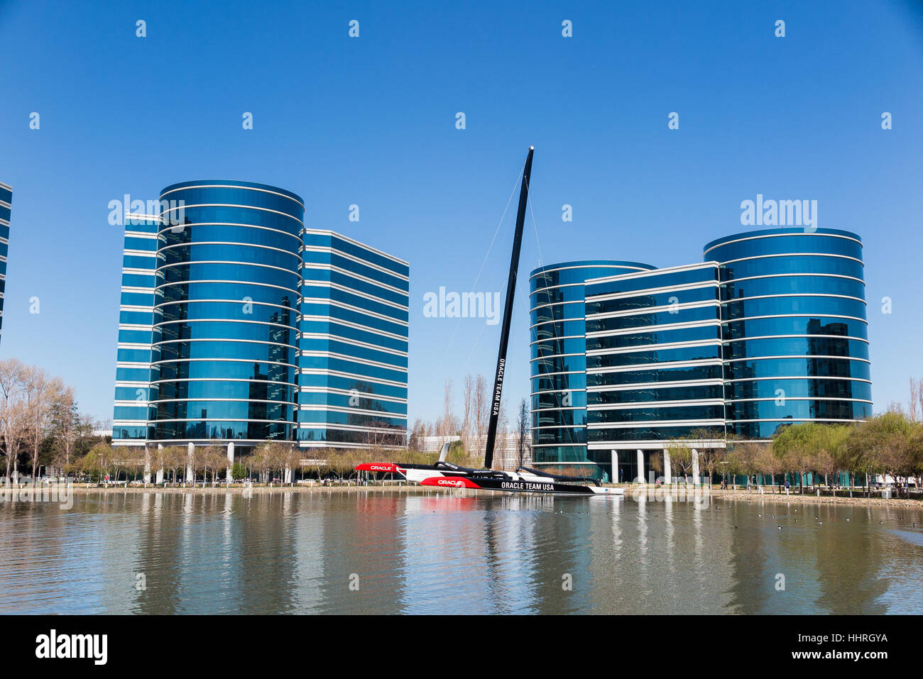 Oracle Corporation headquarters / buildings with a Oracle Team USA yacht  racing boat in a pool at Redwood Shores, California Stock Photo - Alamy
