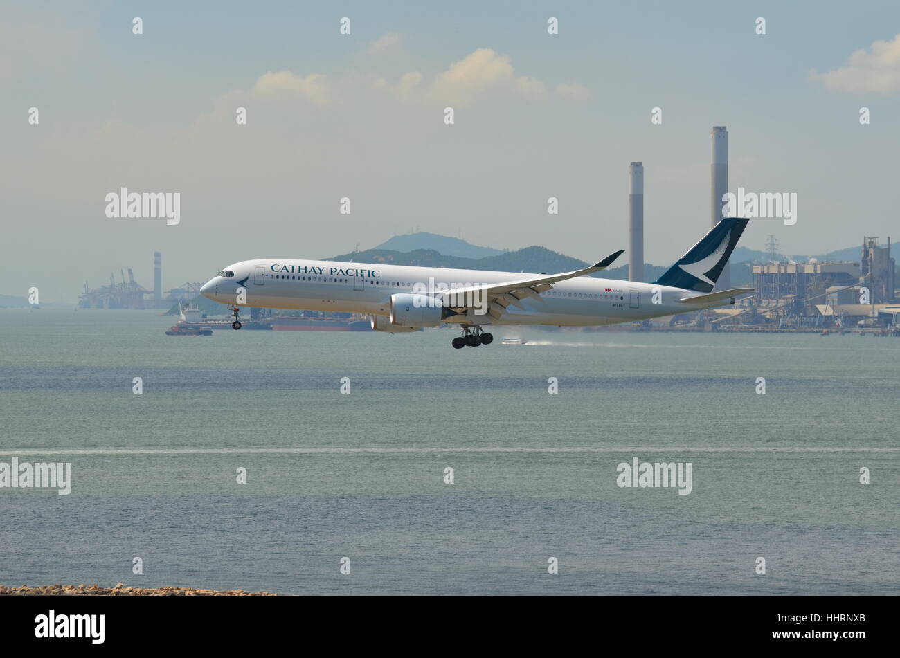 Cathay Pacific Airbus 350-900 landing at Hong Kong International Airport Stock Photo