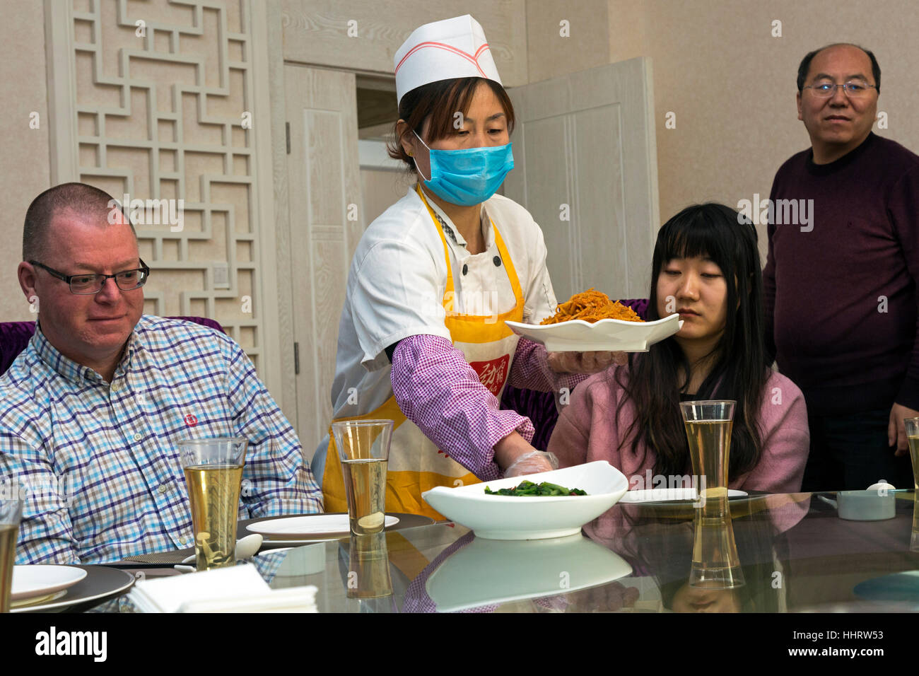 Service at Chinese banquet, Zhongwei, Ningxia province, China Stock Photo