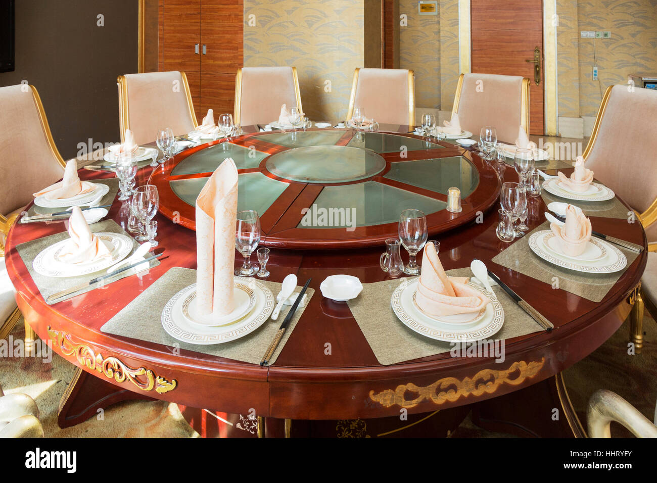 Place settings at Chinese restaurant dinner table, Wuzhong, Ningxia province, China Stock Photo