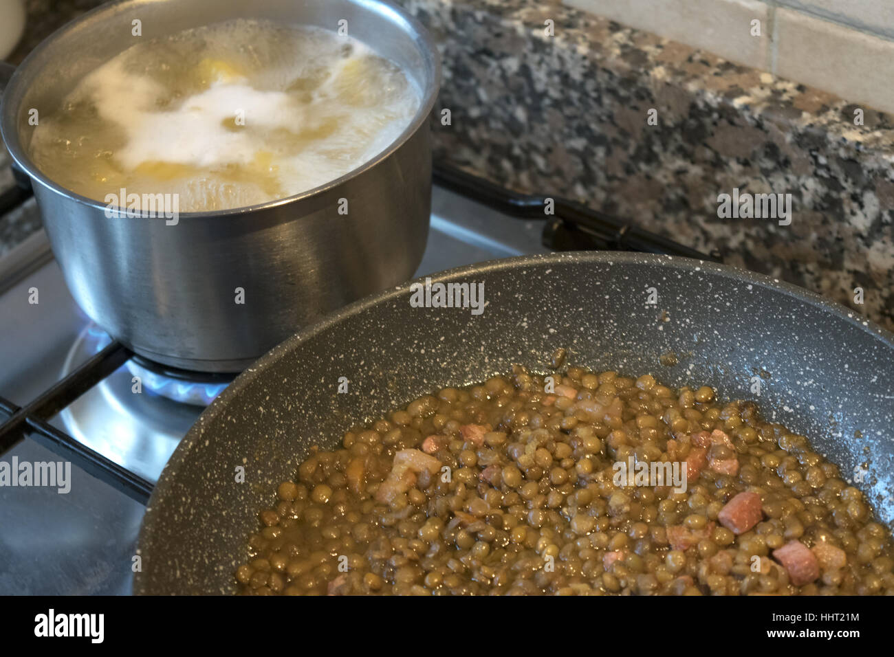 lentils and pasta cooking on the stove Stock Photo Alamy