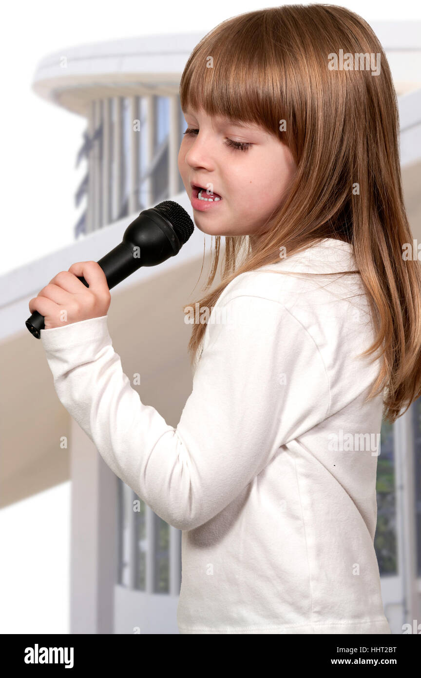 Beautiful girl singer performing at a concert Stock Photo Alamy