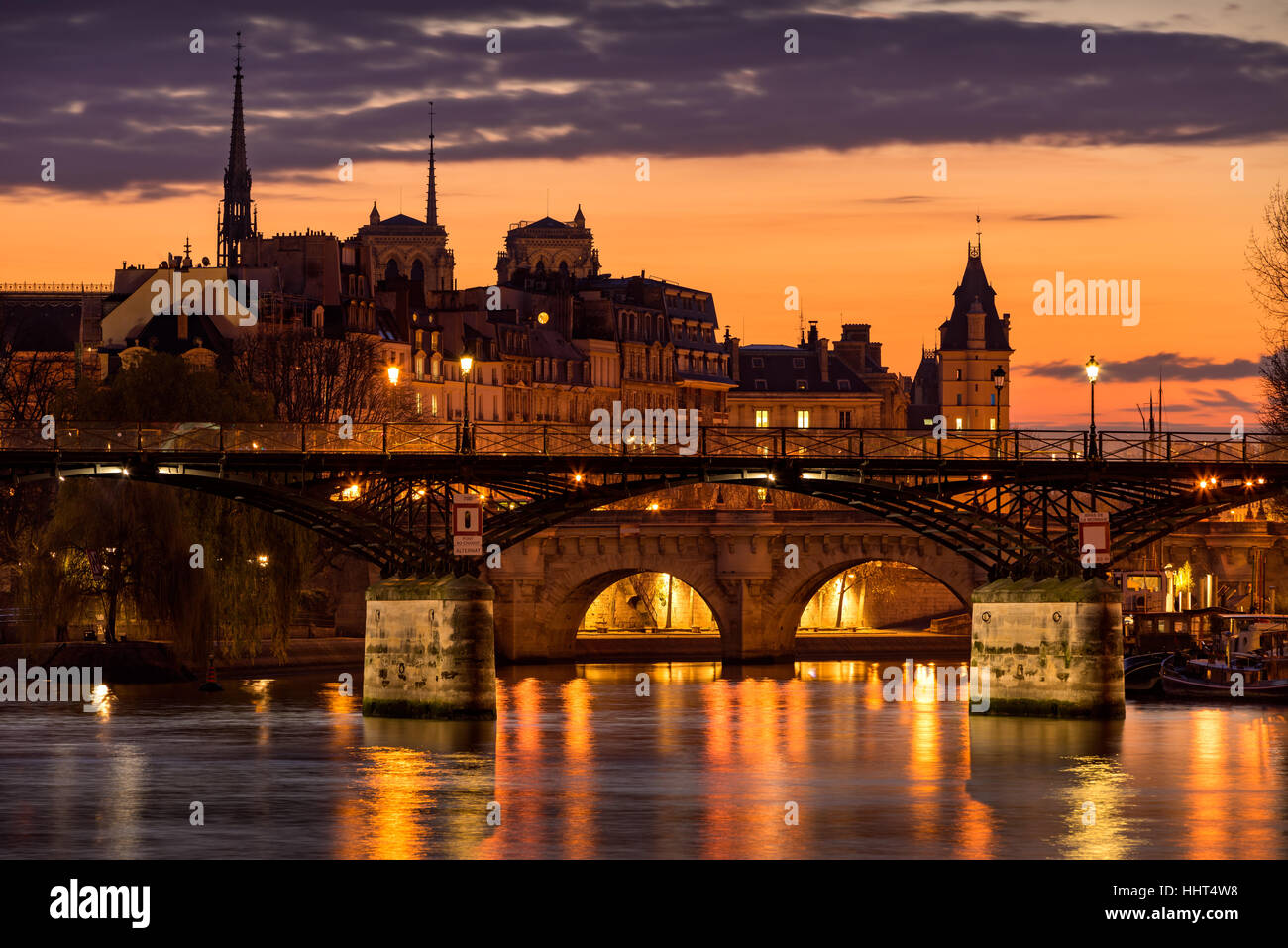 Sunrise on Ile de la Cite with view on the Pont des Arts, Pont Neuf and the Seine River. 1st Arrondissement, Paris, France Stock Photo