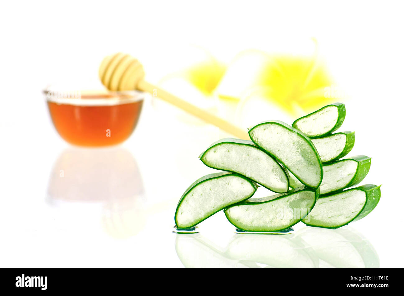 Aloe vera and honey for hair and facial treatment paste mask ingredients on white background. Stock Photo