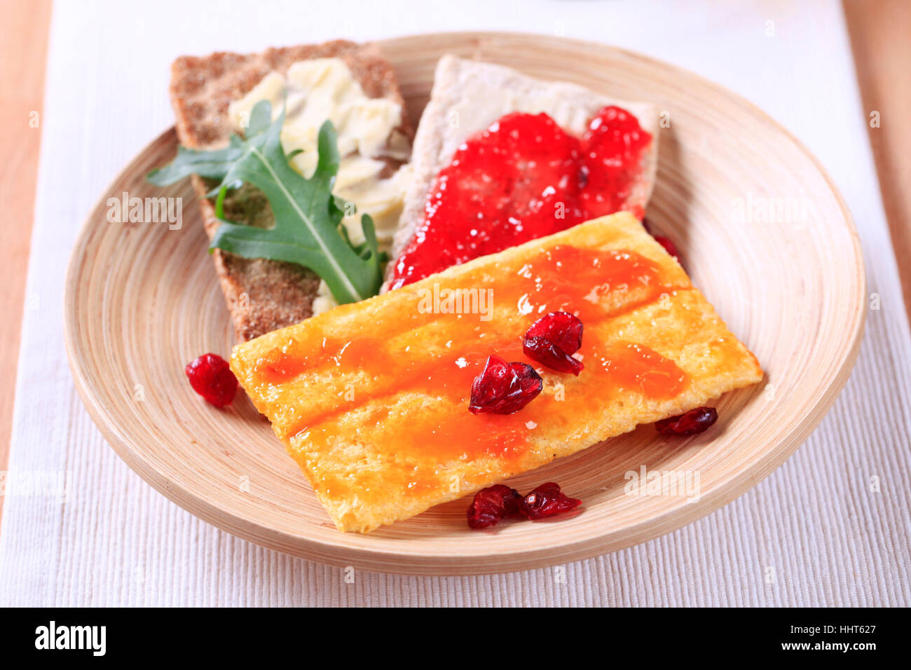 Various kinds of crispbread with jam Stock Photo