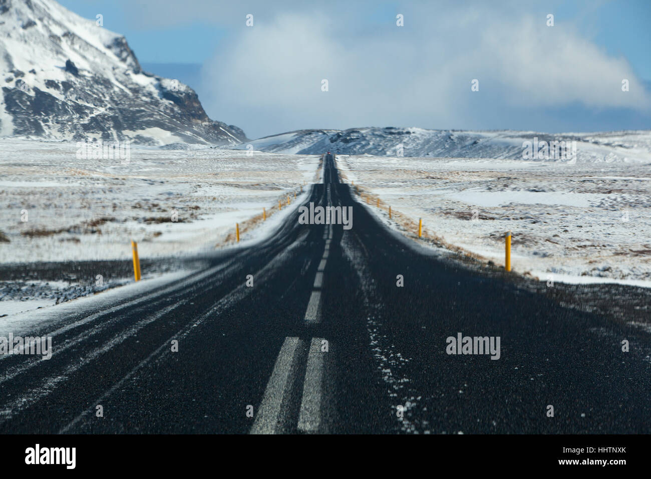 Wet and slippery road in Iceland, winter Stock Photo