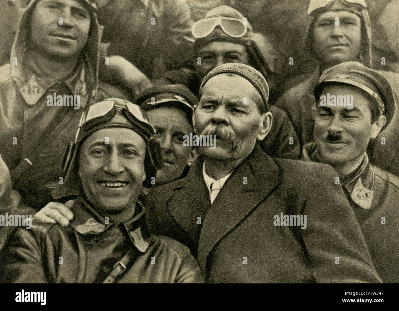 Maxim Gorky (28 March 1868 – 18 June 1936), Russian author, with Soviet airmen / pilots.1931. Stock Photo
