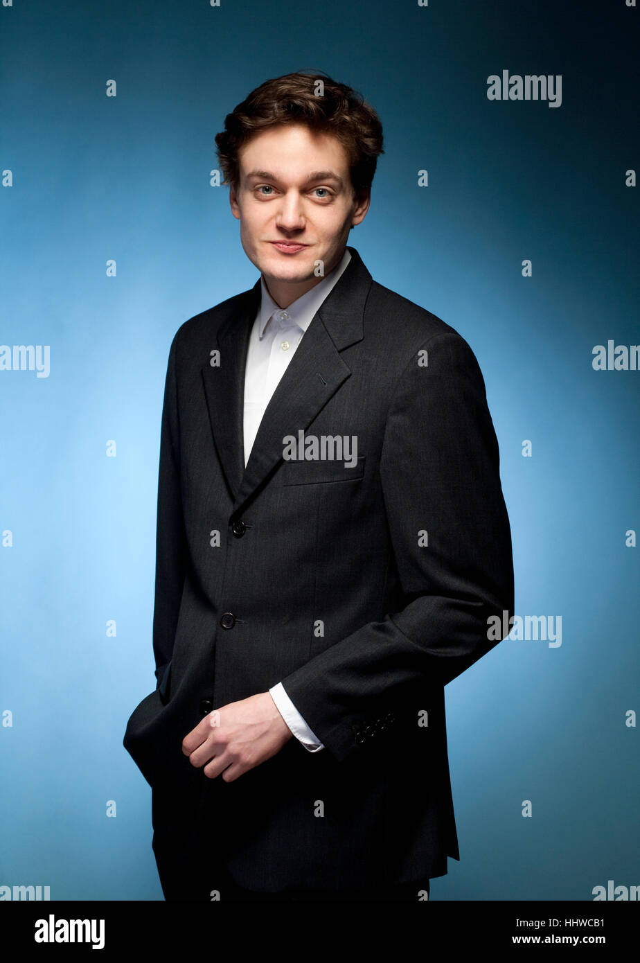 Portrait of a Young Man in Suit Stock Photo - Alamy