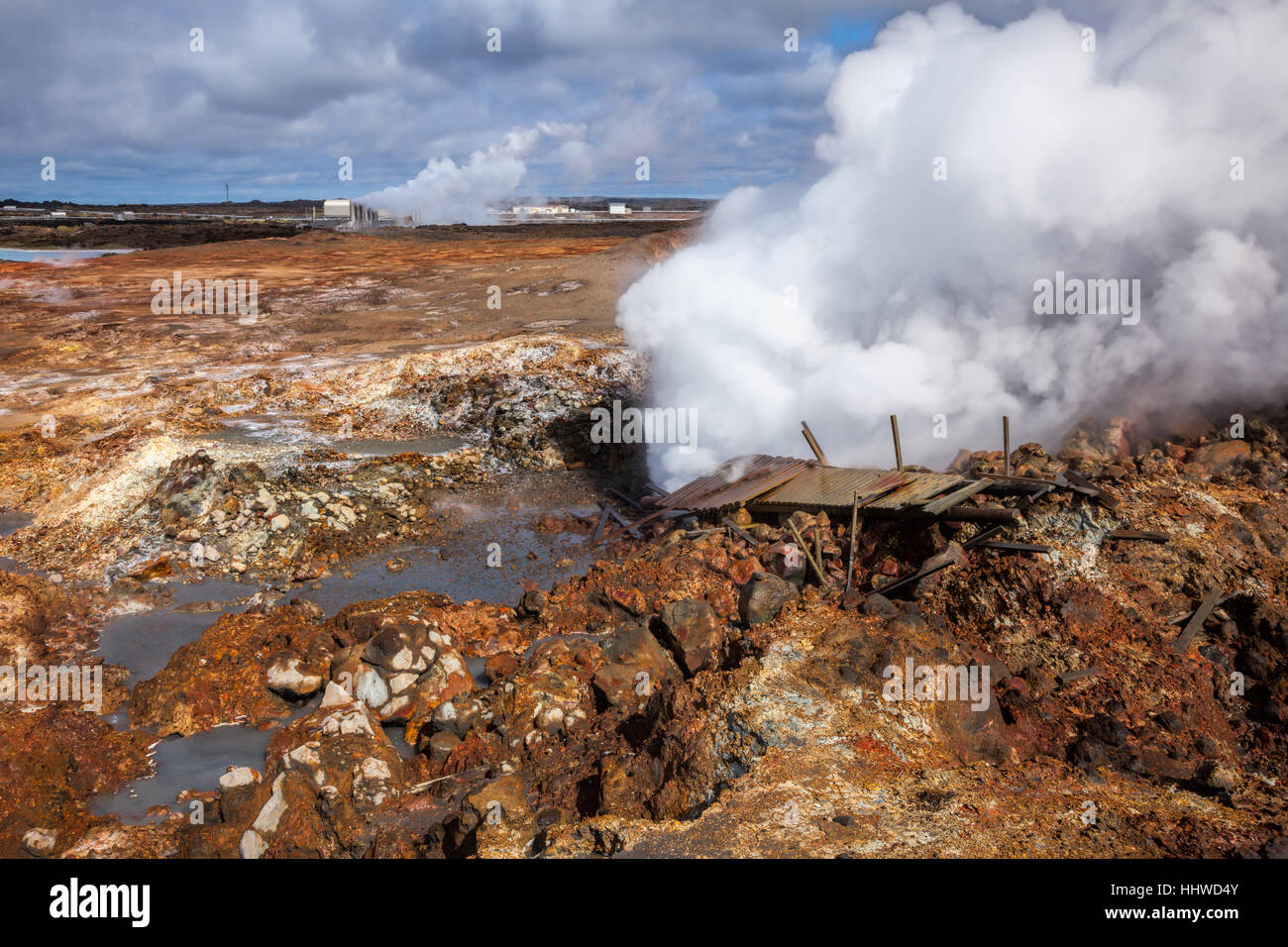 Damaged broadwalk near steaming fumarole at Gunnuhver geothermal area in the southwest part of the Reykjanes Peninsula of Iceland Stock Photo