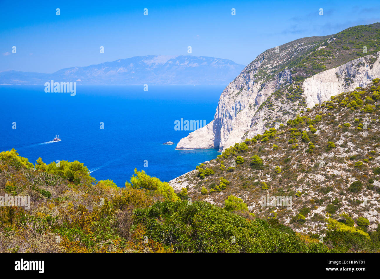 Navagio bay, Greece, coastal landscape. White rocks under blue sky, natural landmark of Greek island Zakynthos Stock Photo