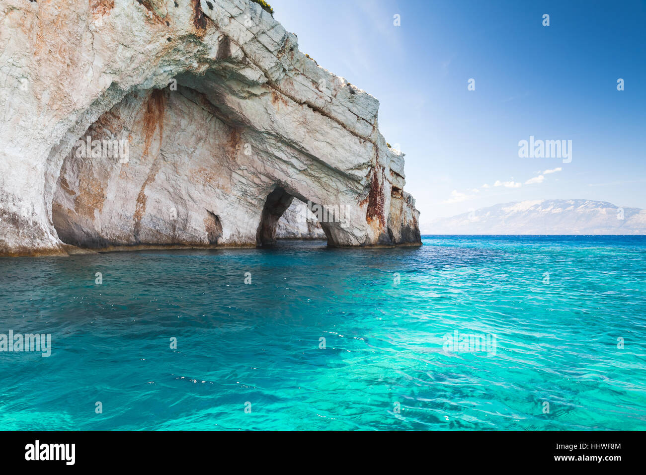 Blue caves, coastal rocks of Greek island Zakynthos with stone arches natural landmark, popular touristic destination Stock Photo