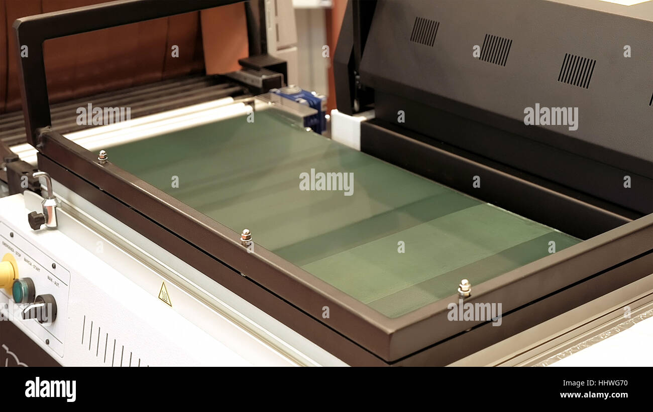 Vacuum package machine on conveyor belt Stock Photo Alamy