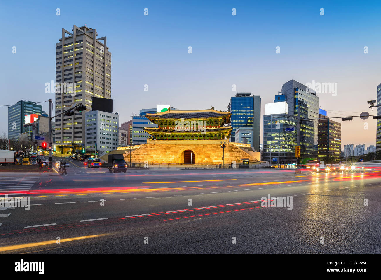 Namdaemun Gate and city skyline at night, Seoul, South Korea Stock Photo