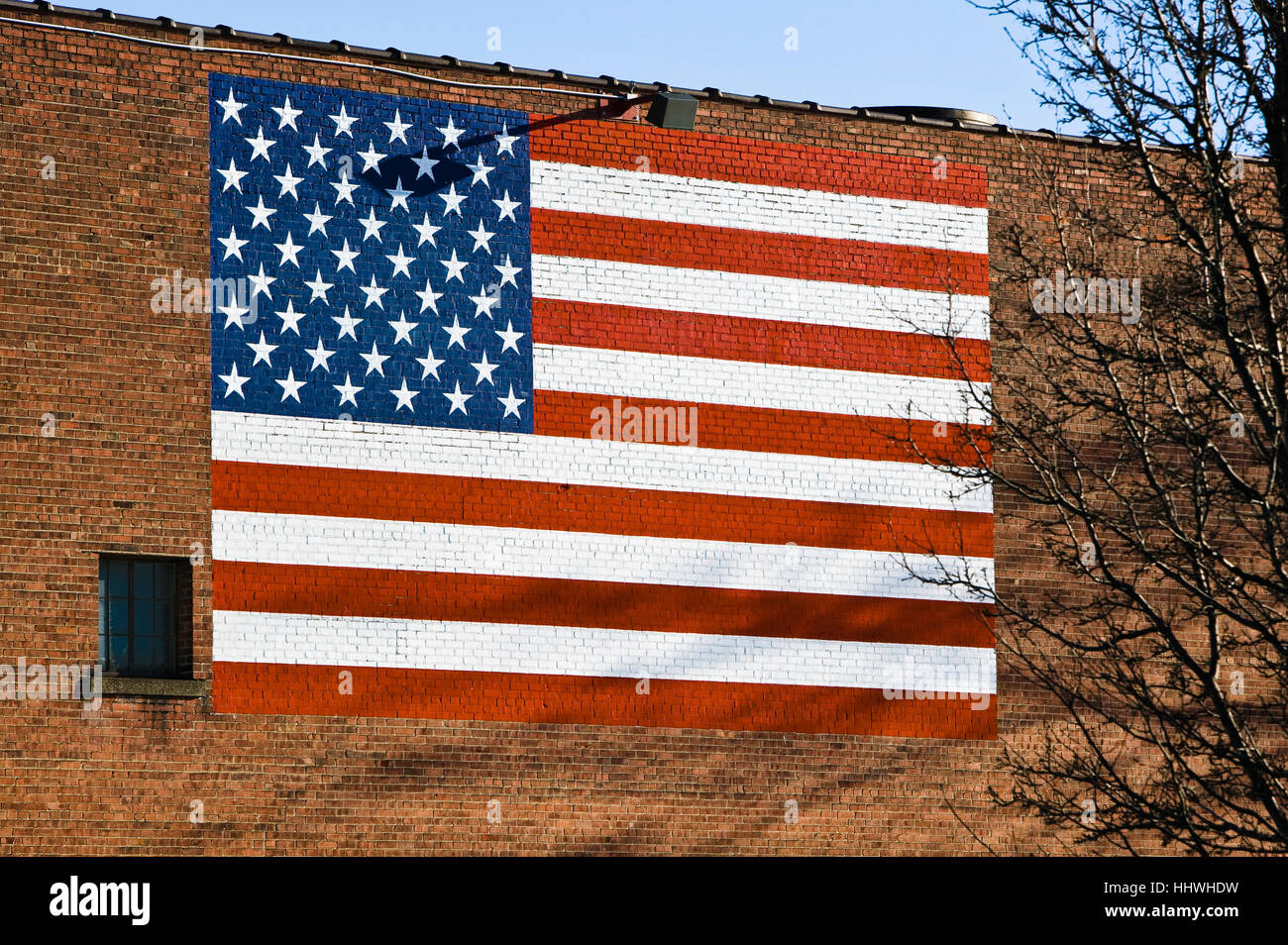 The flag of the United States of America painted on the side of a brick ...