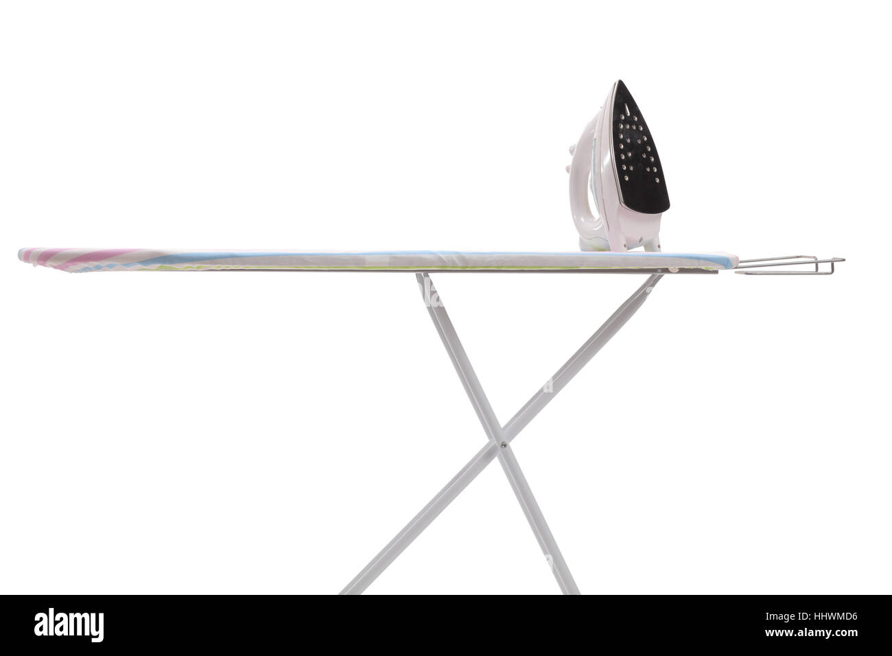 Iron on an ironing board isolated on white background Stock Photo Alamy