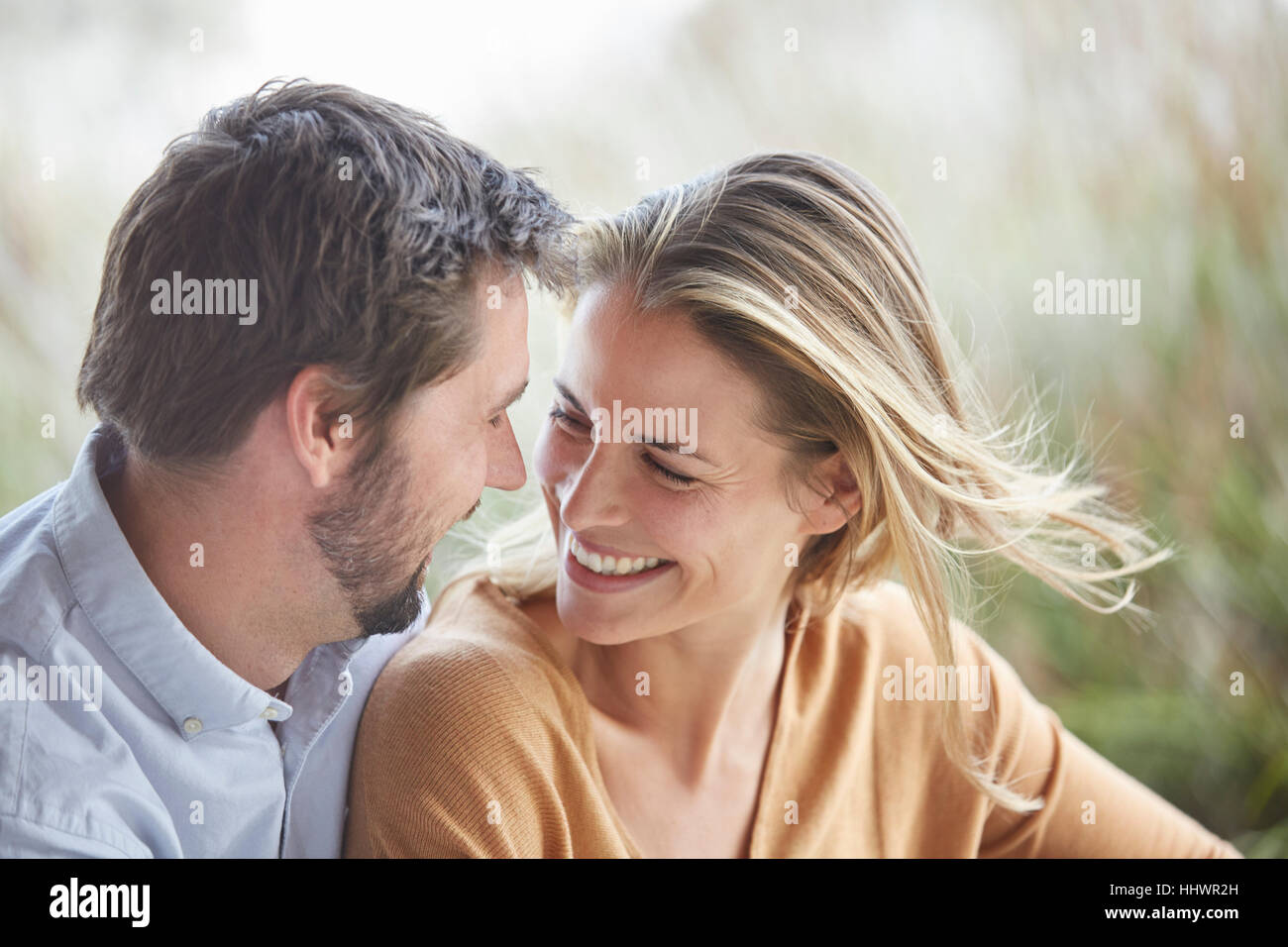 Smiling affectionate couple face to face Stock Photo