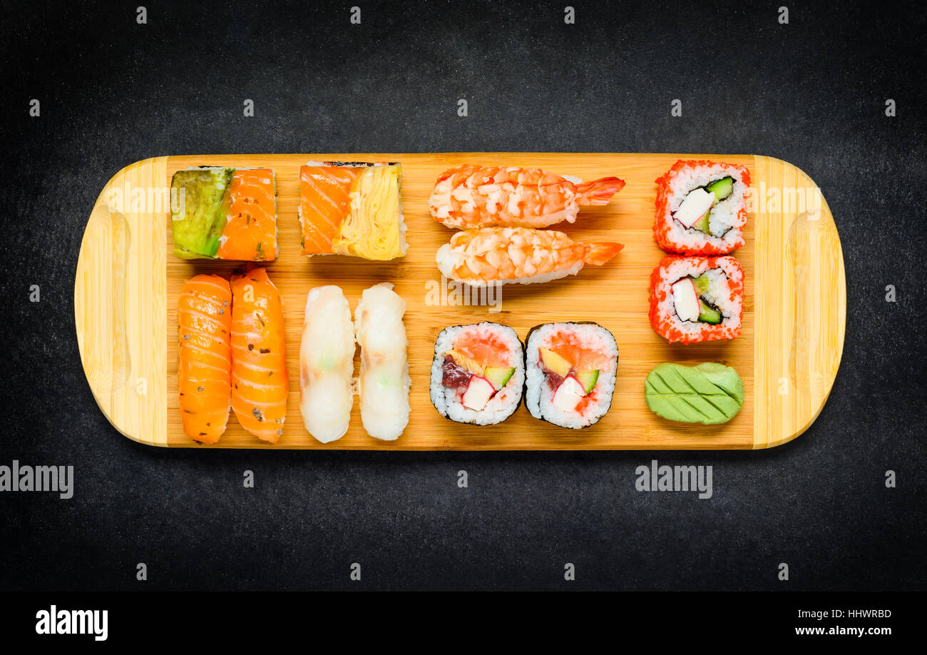 Japanese delicacy cuisine Food with Sushi Rolls, Sashimi, Surimi and