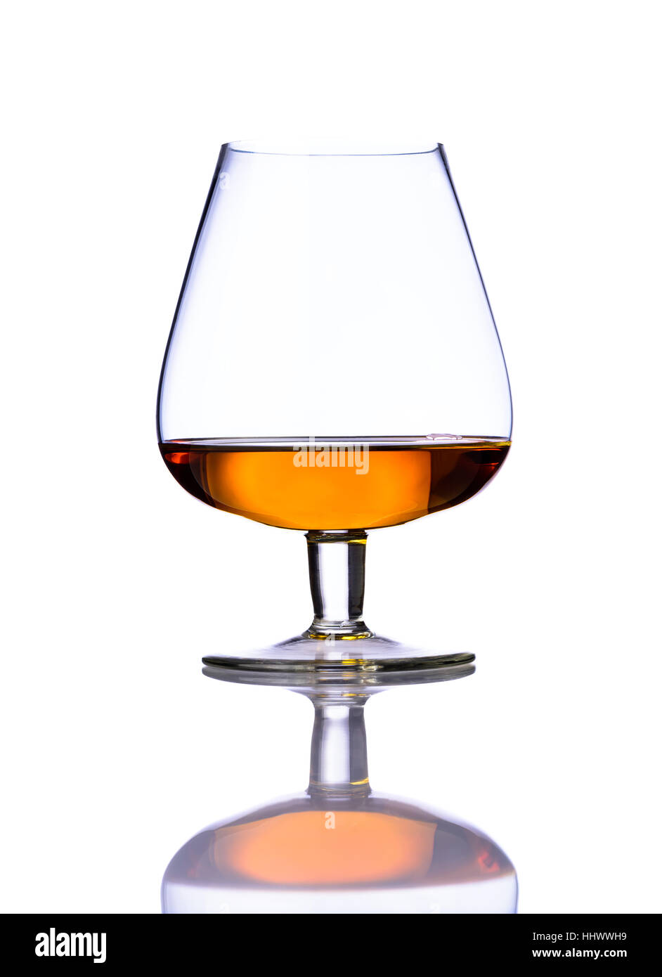 One glass of cognac brandy isolated on white background Stock Photo - Alamy