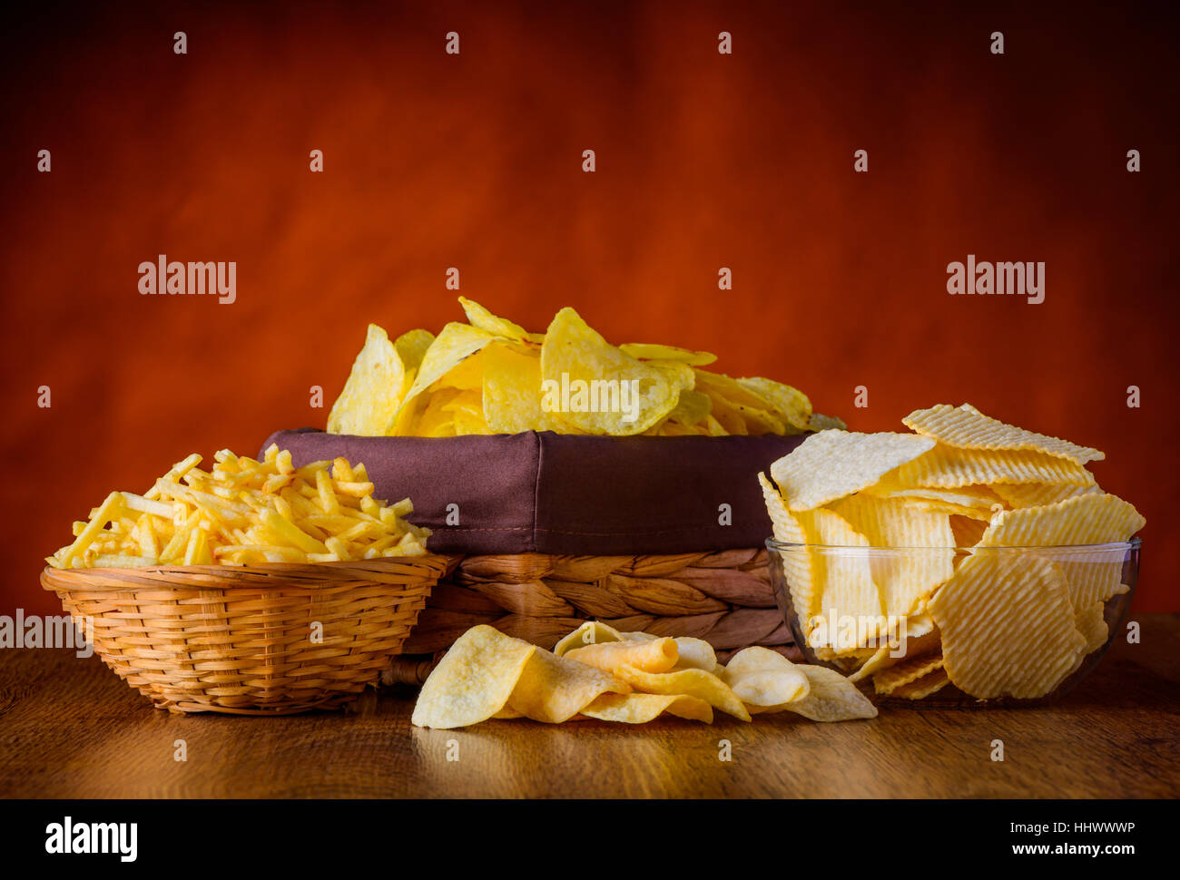 different types of Potato junkfood, chips and sticks in still life
