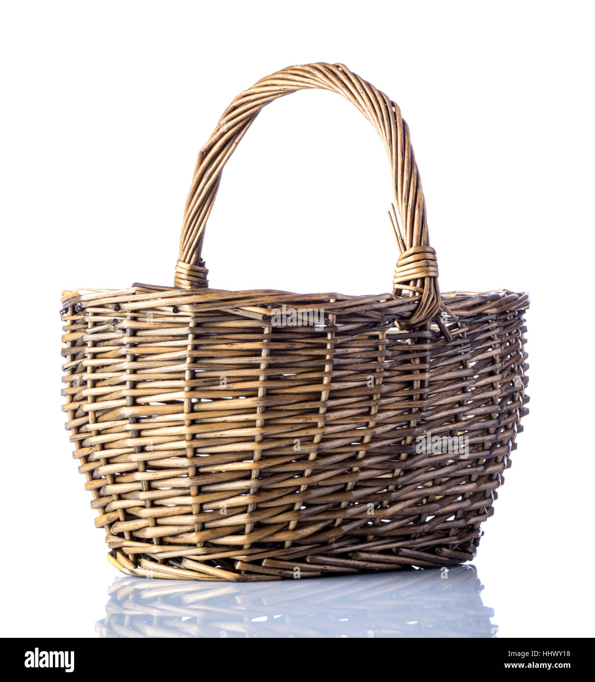 Wooden woven empty picnic basket isolated on white background Stock