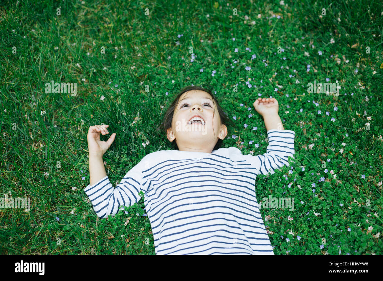 Child on the grass Stock Photo
