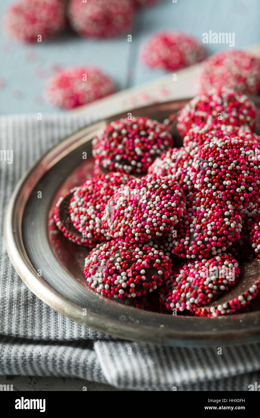 Valentine's Red and White Chocolate NonPareils with Sprinkles Stock