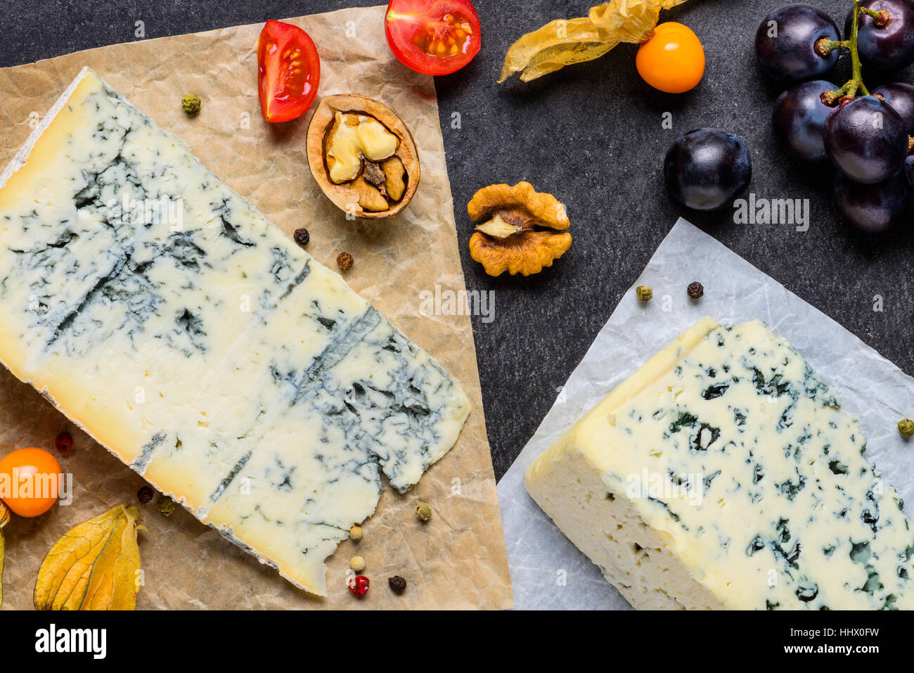 Danish Blue Mold Cheese with Poha Fruits, Grapes and Tomato Stock Photo