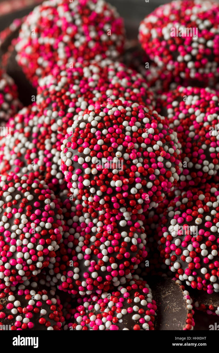 Valentine's Red and White Chocolate NonPareils with Sprinkles Stock