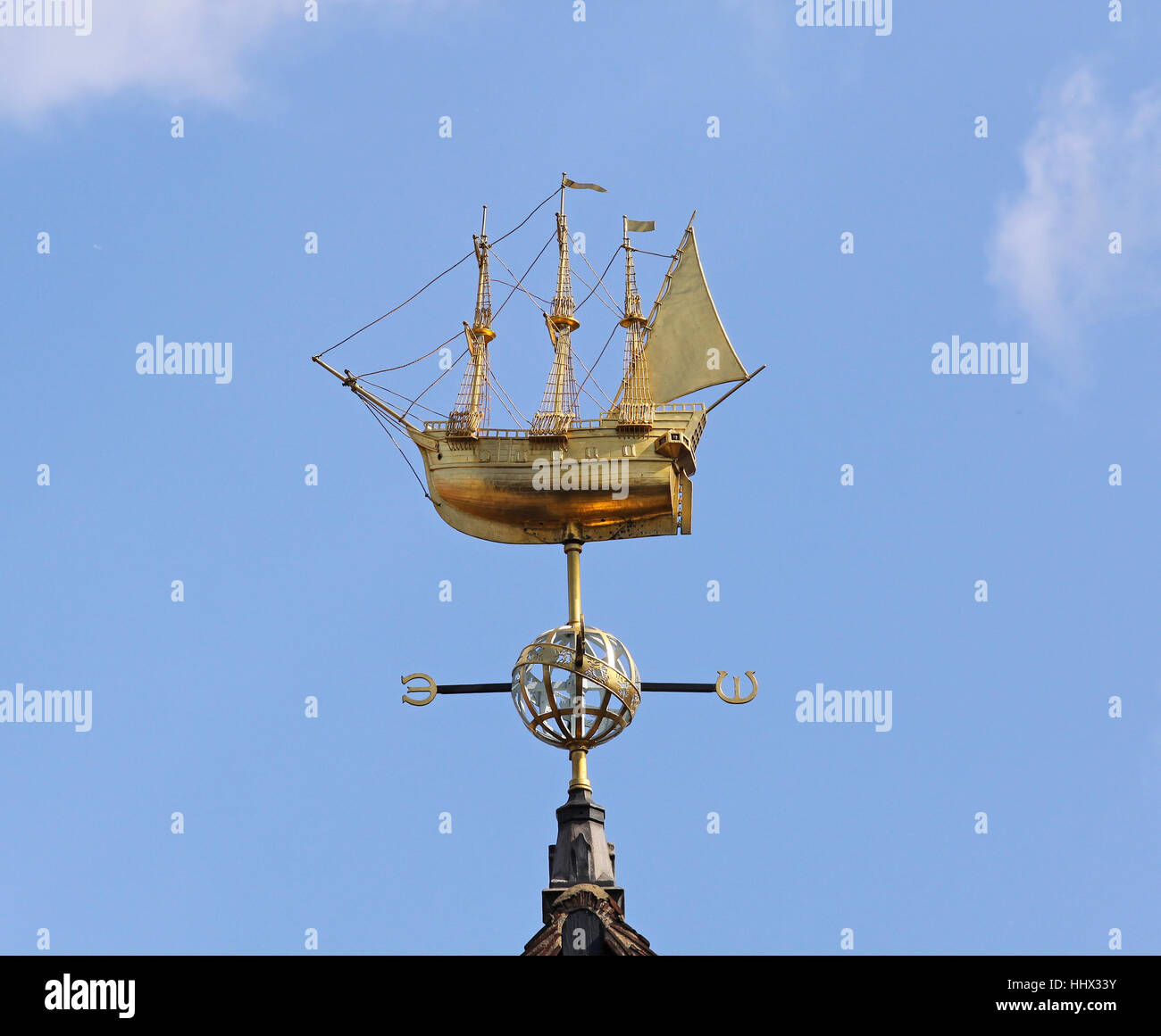 Wind direction indicator on top of roof Stock Photo Alamy