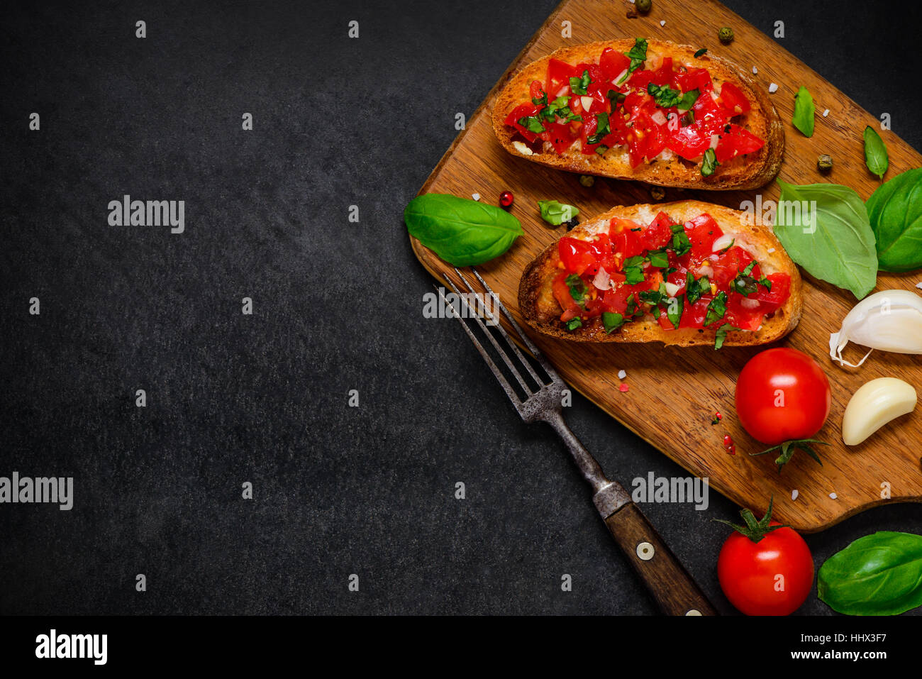 Italian Food Antipasto Bruschette with Fresh Tomato and Basil on Copy Space Text Area Stock Photo