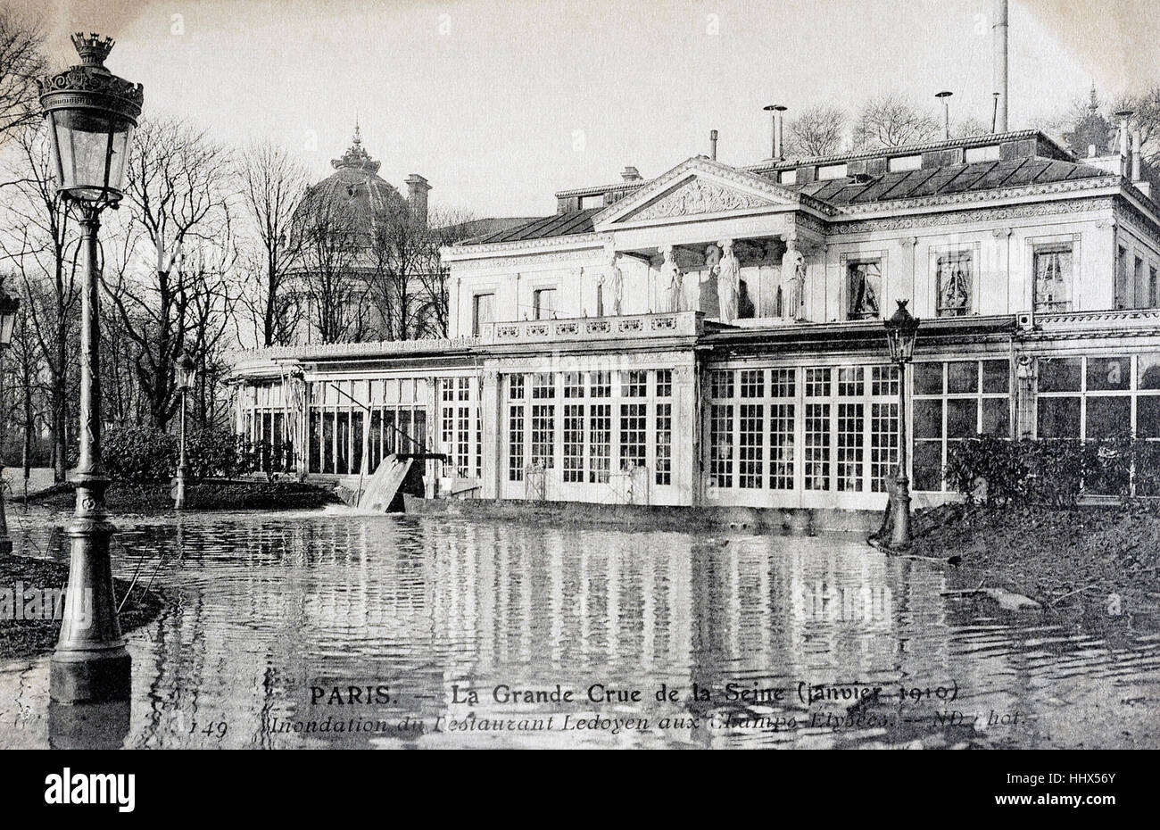 old postcard of Paris floods of January 1910, flooding the Ledoyen restaurant on the Champs Elysee Stock Photo