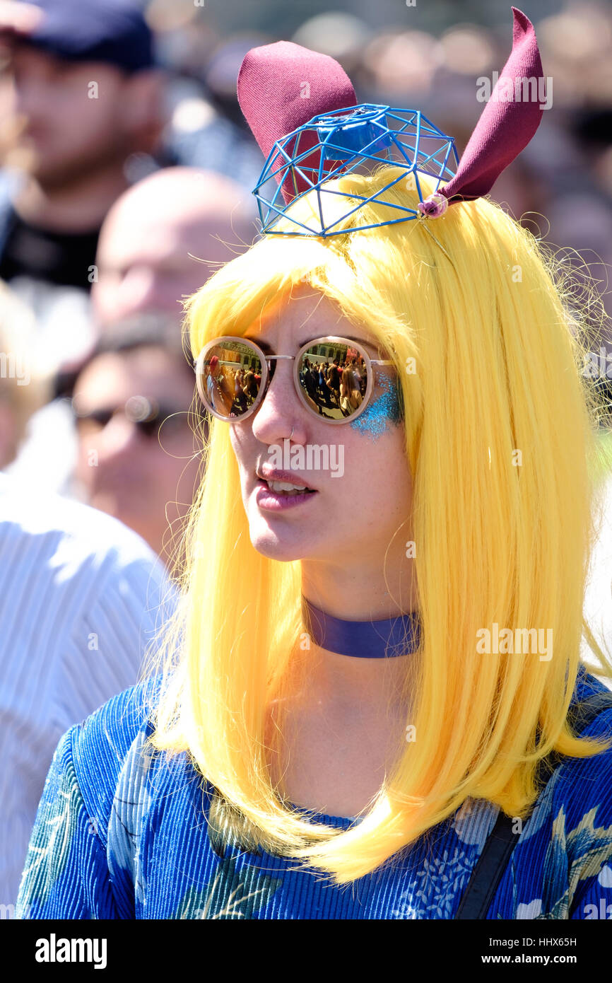 Protestor dressed as the European Union in blue dress and yellow hair attends the March for Europe. Stock Photo