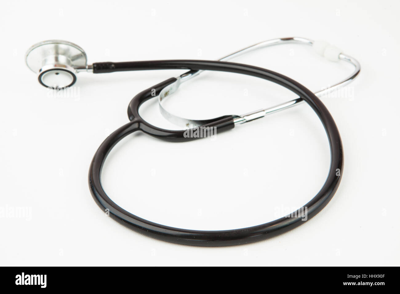 Black stethoscope on white background Stock Photo - Alamy