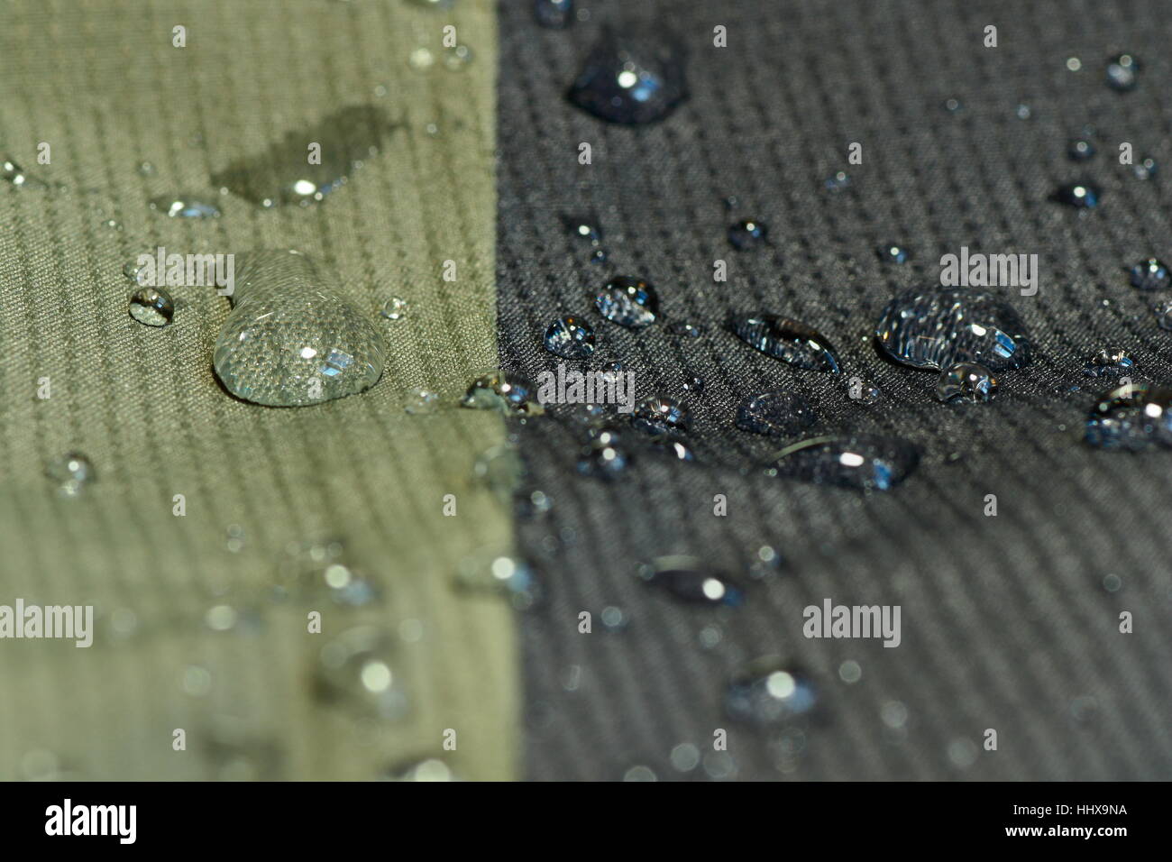 detail of  water repel textile material, green and black, shallow depth of field Stock Photo