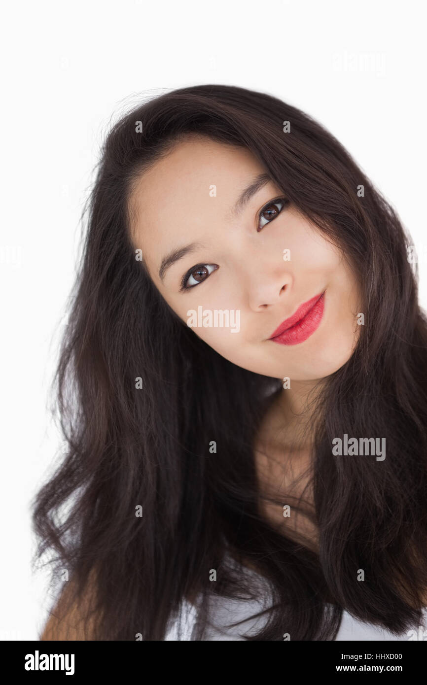 Smiling brunette on white background Stock Photo - Alamy