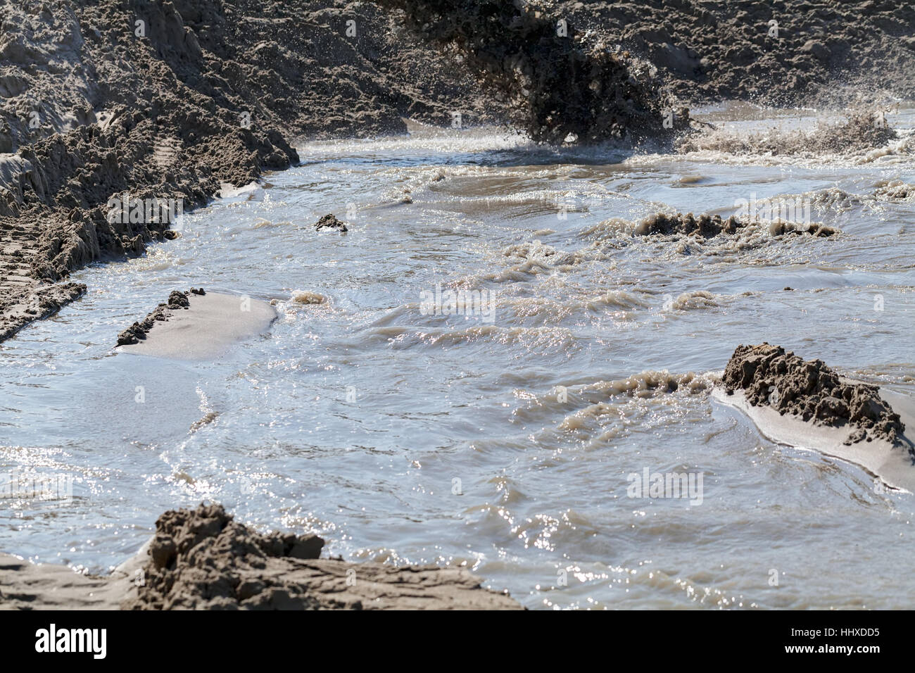 sand and mud in industrial water, note shallow depth of field Stock ...
