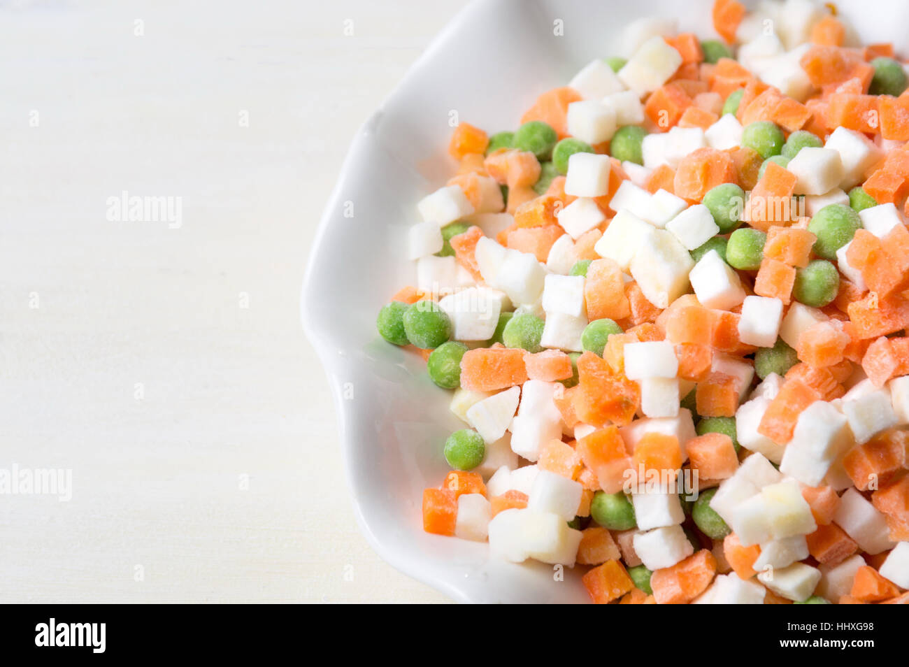 Frozen vegetables on a plate for making salad Stock Photo Alamy