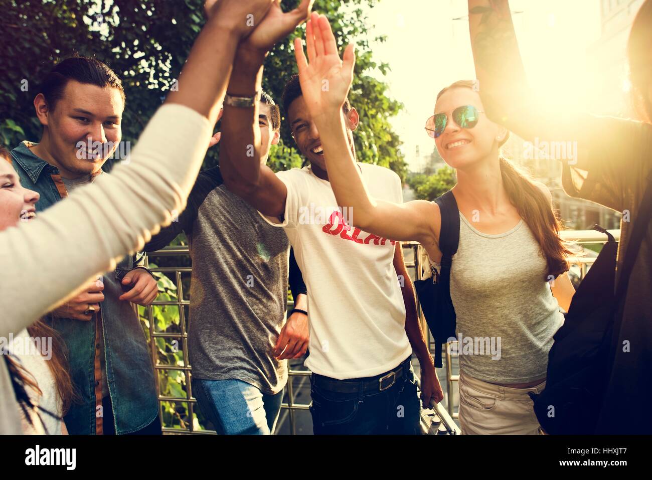 Diverse Group People High Five Concept Stock Photo - Alamy