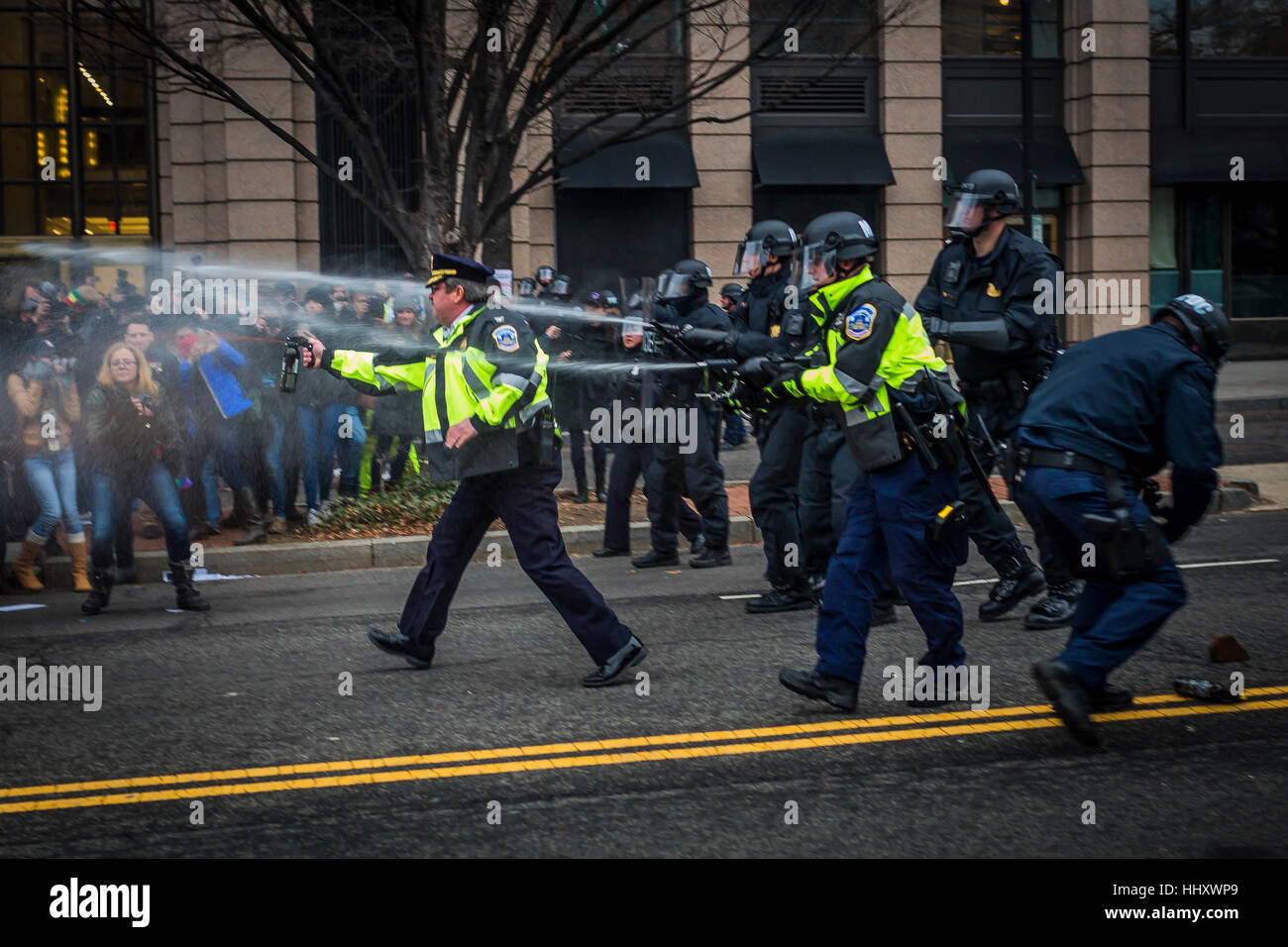 Washington, USA. 20th Jan, 2017. Hours after Donald Trump was inaugurated as the 45th President of the United States, On January, 20, 2017, protesters clashed with riot police, who responded with pepper spray, tear gas, rubber bullets and flash grenades. Credit: PACIFIC PRESS/Alamy Live News Stock Photo