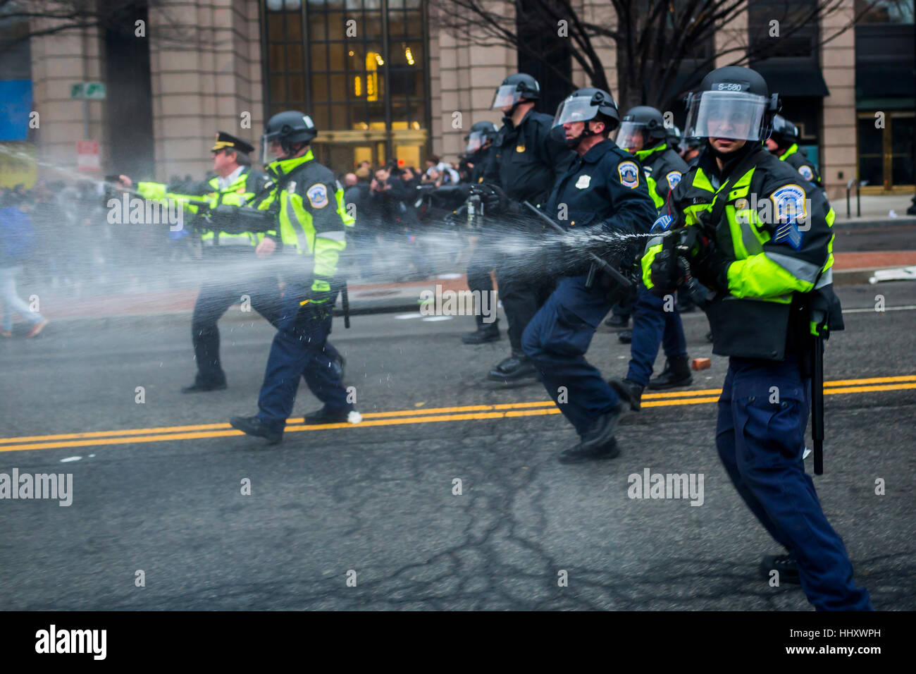 Washington, USA. 20th Jan, 2017. Hours after Donald Trump was inaugurated as the 45th President of the United States, On January, 20, 2017, protesters clashed with riot police, who responded with pepper spray, tear gas, rubber bullets and flash grenades. Credit: PACIFIC PRESS/Alamy Live News Stock Photo