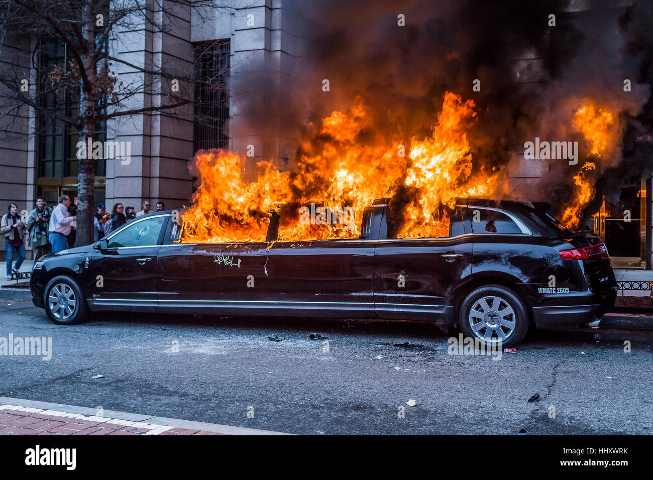 Washington, USA. 20th Jan, 2017. Hours after Donald Trump was inaugurated as the 45th President of the United States, On January, 20, 2017, protesters vandalized property, including setting a limousine ablaze, which escalated the into police to deploy pepper spray, tear gas, rubber bullets and flash grenades. Credit: PACIFIC PRESS/Alamy Live News Stock Photo
