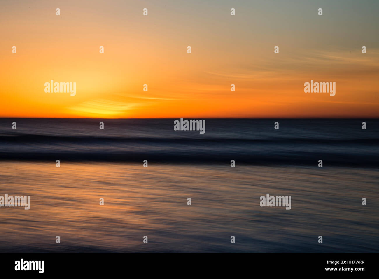 A beatiful sunset over the Pacific Ocean in Carmel, California. Stock Photo