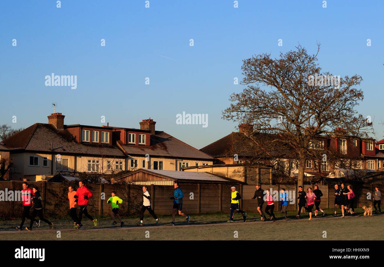 Runners take part in the Gunnersbury Park run as Britain woke up to a chilly weekend with widespread frost potentially causing dangerous driving conditions. Stock Photo