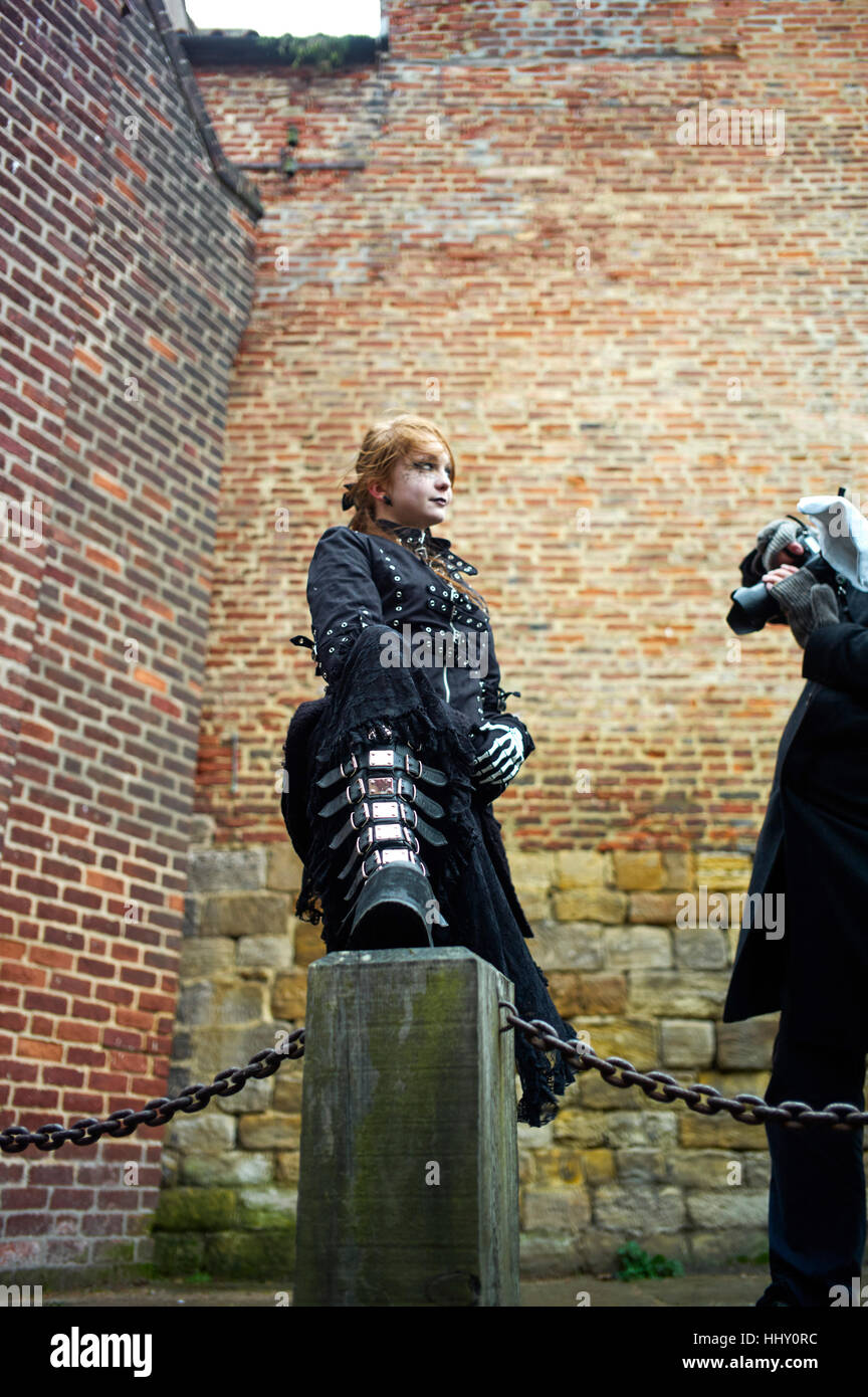 Goth dressed girl posing in Whitby Stock Photo