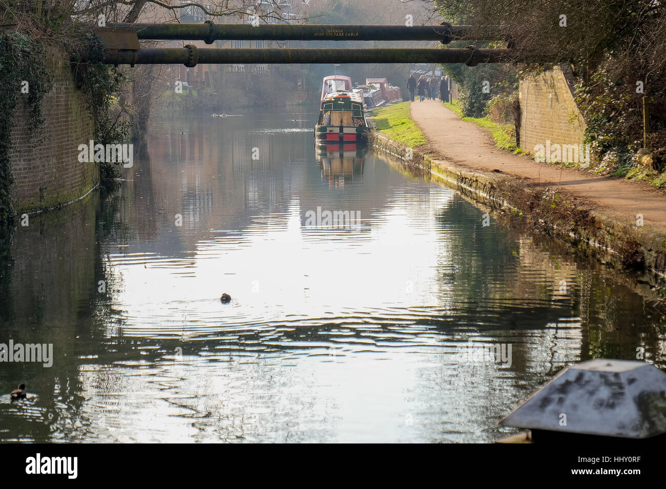 A view of a canal and canal path in Hertfordshire, England Stock Photo