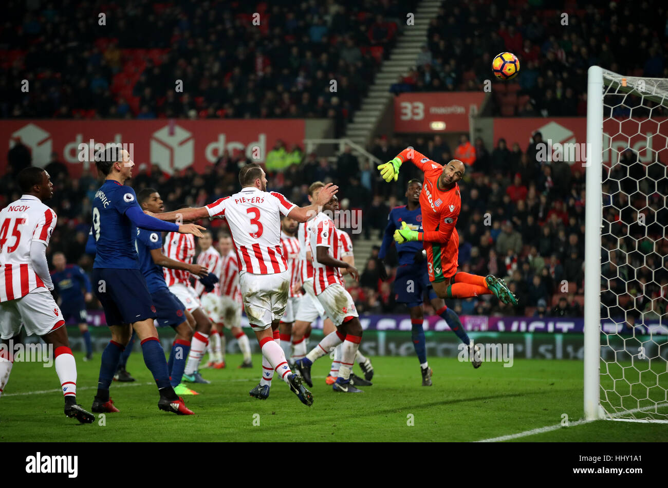 Manchester United's Wayne Rooney (second far back left) scores his side
