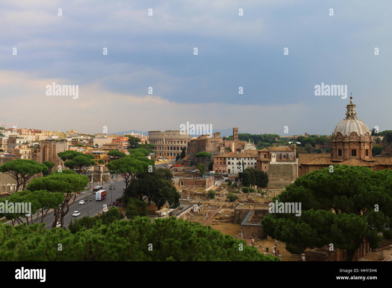 A Rome cityscape, skyline with the Roman Forum and Colosseum in Rome, Italy Stock Photo